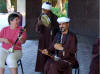 Belinda being invited to play in the band outside the Luxor Hilton Hotel, where lunch had been provided