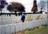 leaving dad alone with his own thoughts - 29th May 1985, the day when dad saw his own father's grave for the first time. An emotional time for us all. Dad, shown here, had just laid a wreath at the grave - situated at Varennes Military Cemetery, Somme, France