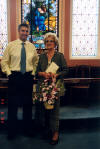 mom & me at Short Cross Methodist church - shows the flowers & cards rec'd for her 80th birthday