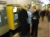 women & machine in total harmony!! Trying to 'feed' the carpark ticket machine after the Concert ... !!