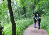 sheltering under the trees during a downpour .. both eating their cakes!!