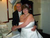 the newly weds cutting the cake ... and Dawn still smiling just after I'd told her Albion was 1 goal down!!!