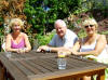 relaxing with a cool drink on Lynne & Ian's decking - well, it seemed like a long walk round Torquay to us . . . !!after