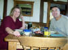 Bev & me at breakfast; bacon rolls - taken by timer on my camera